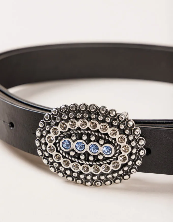 Belt Lola Blue. Silver buckle surrounded by smoke crystals and four blue ones in the center.
