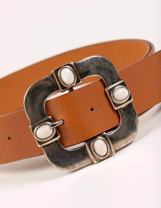 Vittoria belt. Metallic buckle with white stones.